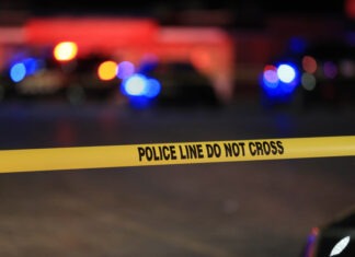Erika Kirk Traumatized Again After Second Shooting crime scene, police tape, police line, investigation, law enforcement, emergency lights, police vehicle, night scene