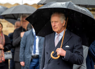 King Charles’ Ex-Girlfriend is Dead at 75 King Charles, British monarch, royalty, umbrella, rain, formal event, public appearance