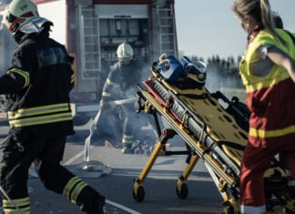 37 Killed After Inhaling Hazardous Fumes firefighters, paramedics, stretcher, emergency response, rescue scene, smoke, fire truck, first responders
