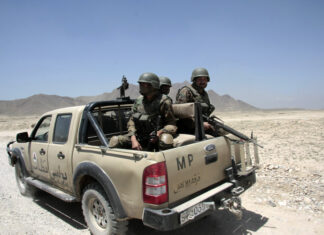 9 Police Officers Killed in Shooting military police, MP, armed forces, desert patrol, soldiers, helmets, pickup truck, Afghanistan, security patrol, mountains