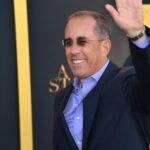 Jerry Seinfeld Called Out by Popular Co-Star Jerry Seinfeld, comedian, actor, red carpet, premiere, Dolby Cinema, waving