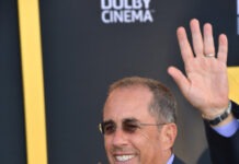 Jerry Seinfeld Called Out by Popular Co-Star Jerry Seinfeld, comedian, actor, red carpet, premiere, Dolby Cinema, waving