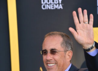 Jerry Seinfeld Called Out by Popular Co-Star Jerry Seinfeld, comedian, actor, red carpet, premiere, Dolby Cinema, waving