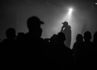 Rapper Died at 23: Cause of Death Revealed concert, rapper, hip-hop performance, stage, performer, audience, music venue, spotlight