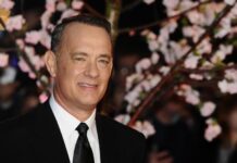 Tom Hanks Issues Chilling Warning About the US Tom Hanks, actor, red carpet, premiere, Hollywood, celebrity, formal attire