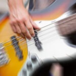 Beloved Musician is Dead at 50 bass guitar, musician, playing bass, performance, strings, live music, guitarist