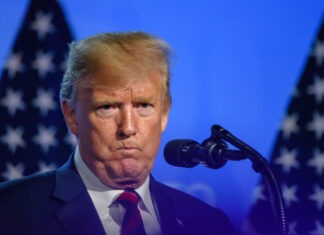 Trump’s Public Humiliation Caught on Live Recording Donald Trump, president, former president, speech, podium, microphone, American flags, rally