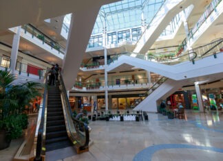 Mass Shooting in Mall: 2 Dead, 3 Hurt shopping mall, retail center, escalator, multiple floors, atrium, skylight, commercial building, interior space