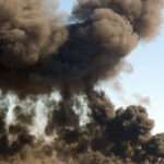 16 Dead in Fuel Tanker Crash explosion, bombing, smoke cloud, blast site, detonation, destruction, emergency scene, disaster