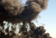 16 Dead in Fuel Tanker Crash explosion, bombing, smoke cloud, blast site, detonation, destruction, emergency scene, disaster