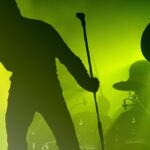Rock Legend Collapses Mid-Concert, Rushed Off Stage concert, rock music, live performance, band, singer, guitarist, drummer, stage, music venue