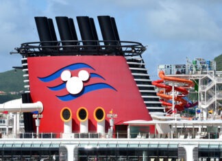 Disney Cruise Passengers Get Kicked Off Ship Disney Cruise Line, cruise ship, Disney, ocean liner, vacation, funnel, Mickey Mouse logo, water slides