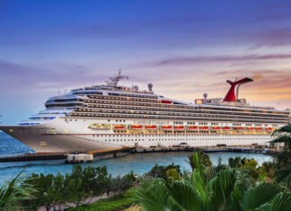 Cruise Passenger Drowns While Snorkeling Carnival cruise ship, cruise line, port, docked ship, passenger ship, tropical destination, sunset, pier