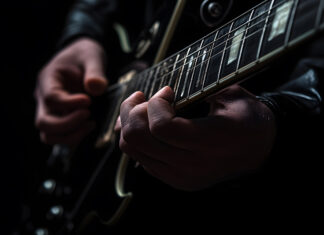 Rock Legend Dies At 79 guitarist, electric guitar, musician, performance, music, live music, guitarist hands, fretboard