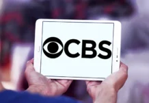 CBS Veteran Suddenly Quits After Decades On Air CBS Logo on Tablet