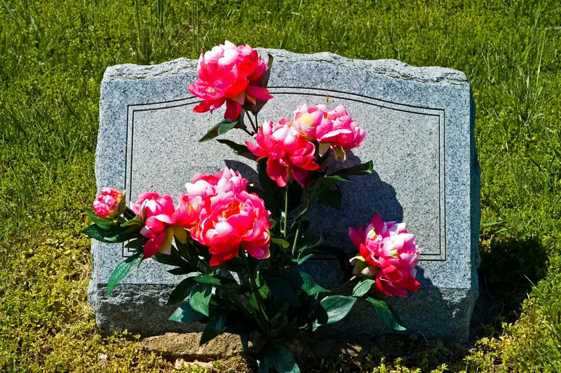Cemetery Headstone with Flowers