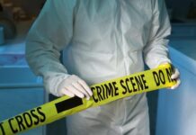 Missing Woman is Found: Dead in Suitcase Missing Woman is Found: Dead in Suitcase (crime scene tapedreamstime_s_425845022)