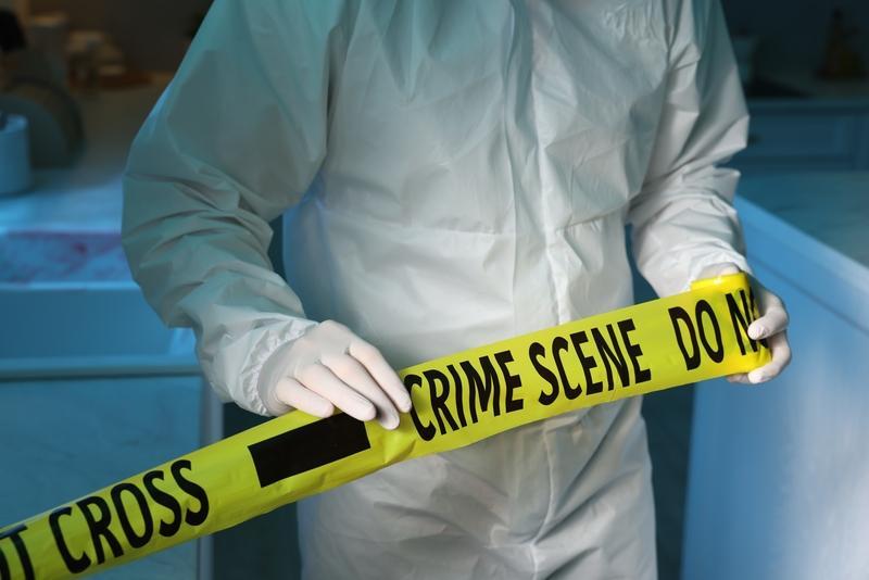 Missing Woman is Found: Dead in Suitcase (crime scene tapedreamstime_s_425845022)