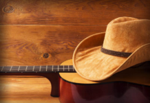 Country Singer Cries Onstage After Hollywood Divorce Country Music Guitar and Hat