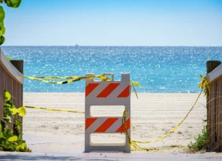 Team USA Star Dies After Drowning Beach Closed Barricade Sign