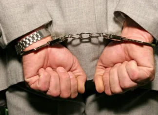 Former President Jailed For 25 Years handcuffs dreamstime_s_1688192