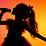 Child Music Star Dead at 8 Years Old Young Girl Singing on Stage -horizontal